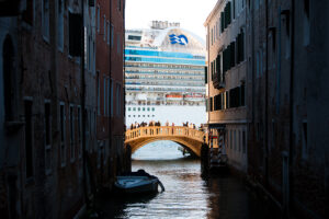 Venice - a cruising vessel enters into Venice harbor, color landscape photo